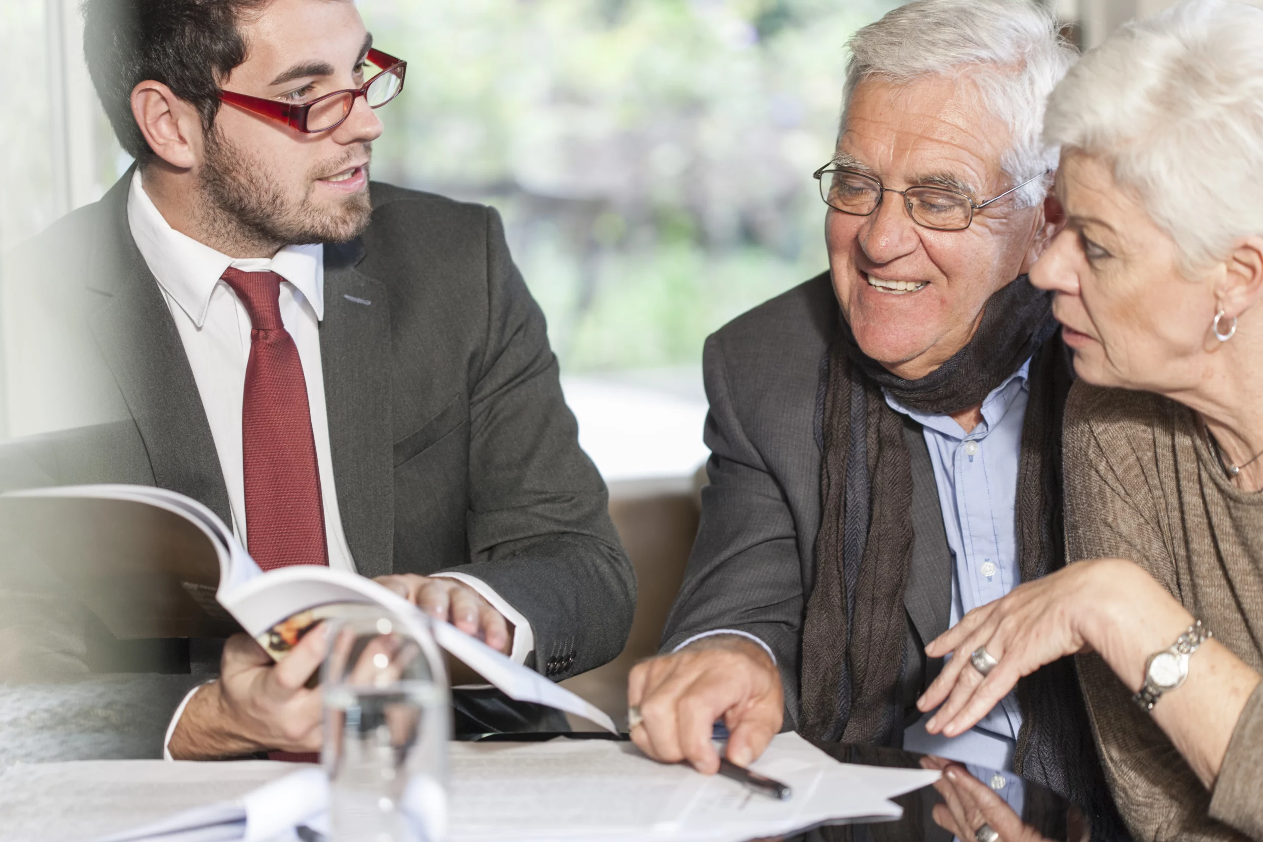 Advisor explaining Medicaid eligibility to senior couple